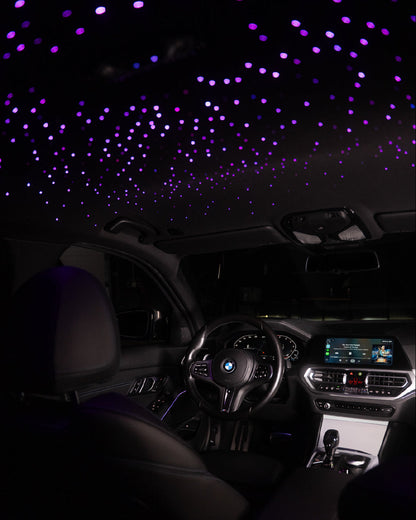 Car interior with starlight projection on the ceiling
